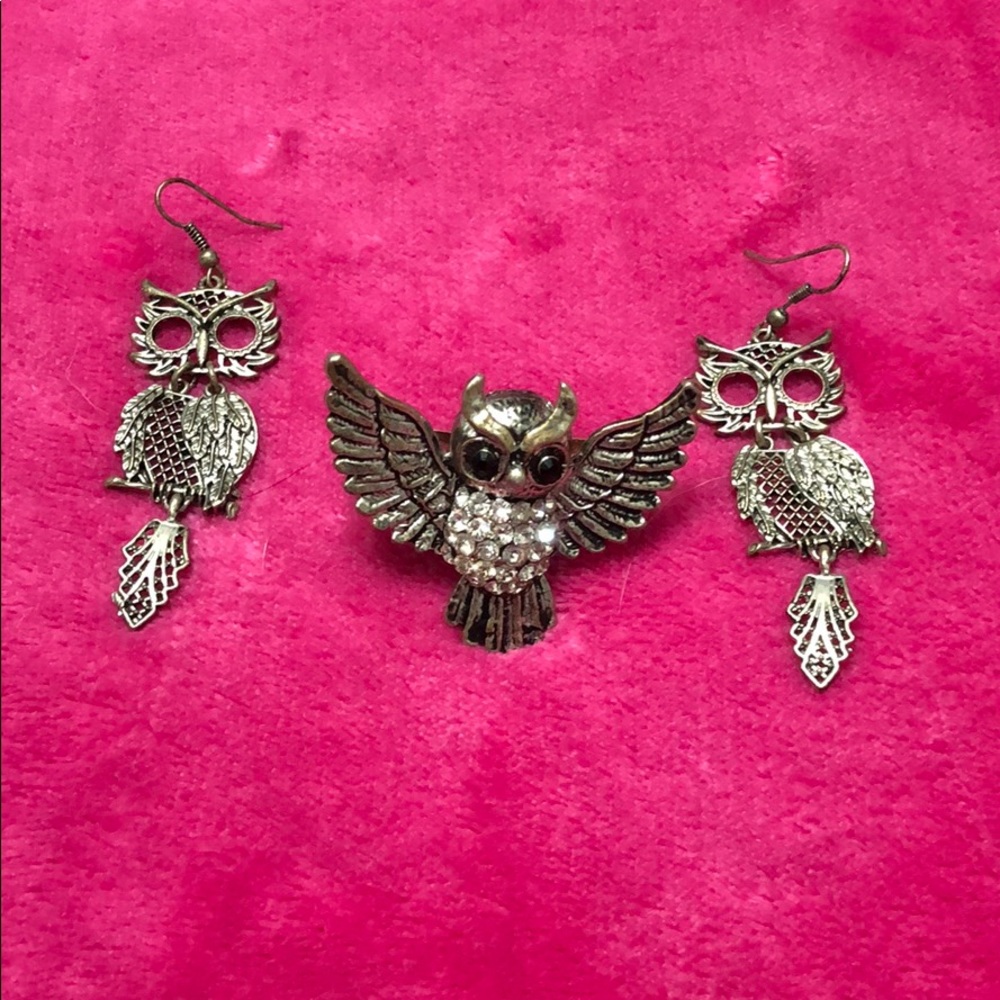 Silver owl earrings and an owl ring